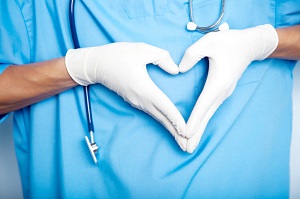 doctor-with-hands-in-heart-0822136