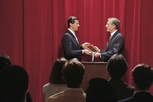 man-accepting-award