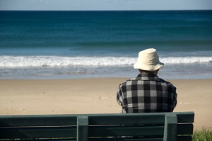 older-man-sitting-alone-on-bench