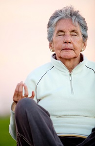 senior-woman-practicing-yoga