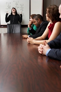 woman-screaming-during-business-meeting