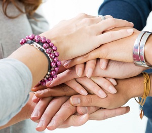 hands stacked together