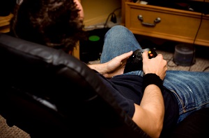 young man playing video game