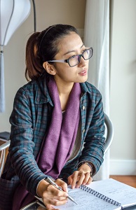 female-writer-daydreaming-112113