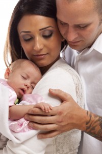 young family with a newborn baby