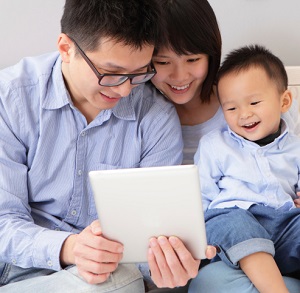 happy family using tablet pc