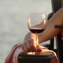 Woman holding a glass of red wine