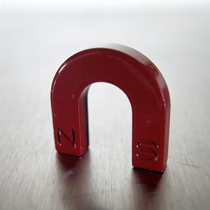 red magnet on table