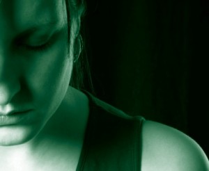 Sad woman with head down