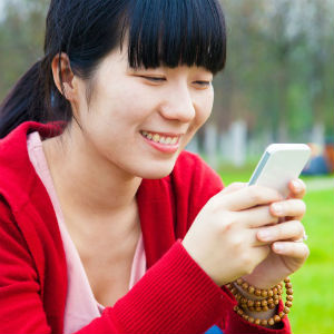 asian woman on smartphone