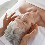 Woman Receiving a Facial Massage