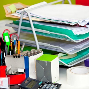 Close-up of real life messy desk in  office