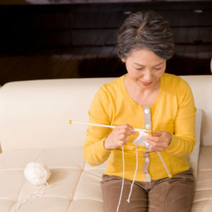 older woman knitting