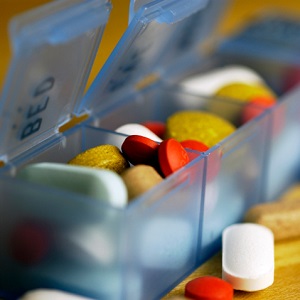 Pill organizer with pills