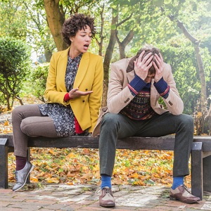 couple arguing in park