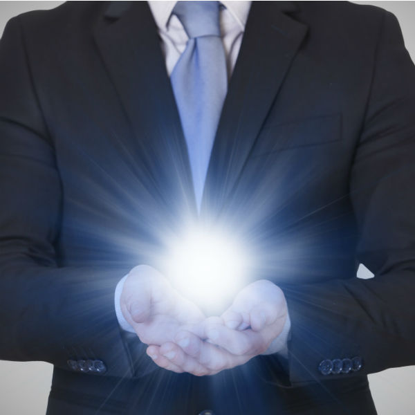 man holding ball of light