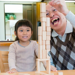 grandparent and child playing