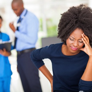 female sick patient in doctor's office