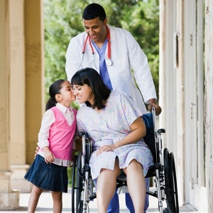 Girl kissing mother at the hospital