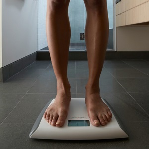 standing on weight scale