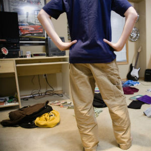 teen boy in his bedroom