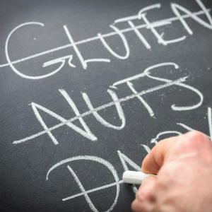 chalkboard with gluten nuts and dairy crossed off