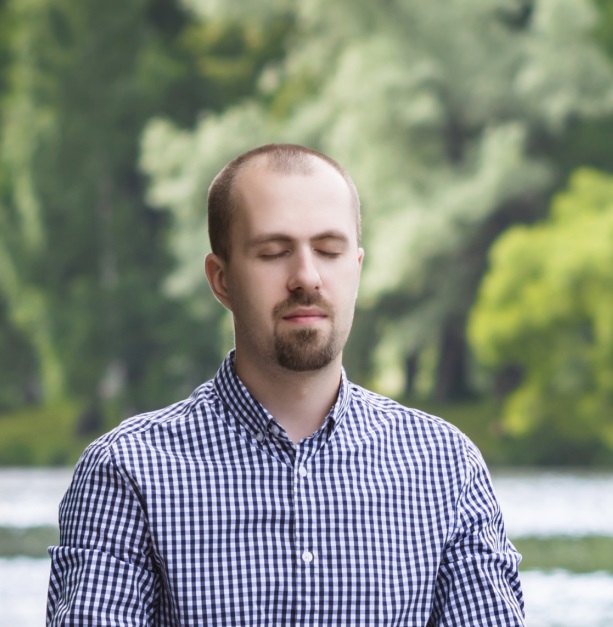 A man breathes with eyes closed