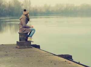 sad-teen-looking-over-water-2