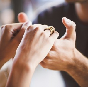 Couple holding hands in cafe