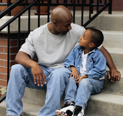 Father and Son Sitting on Stairs