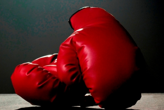 Boxing gloves in spotlight