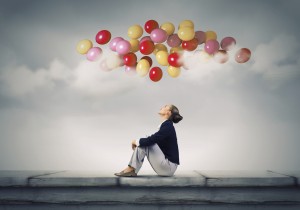 Woman looking at balloons