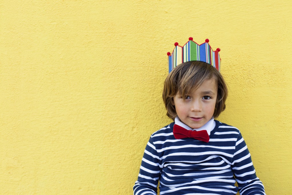 little kid wearing a crown