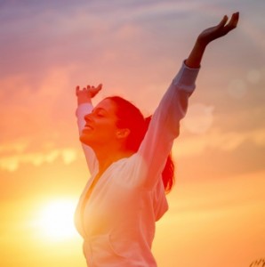 Woman with arms raised