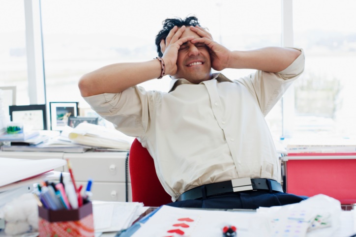 stressed man at his desk