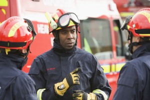 Three rescue workers talking