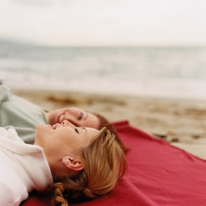 Two Women Talking on the Beach
