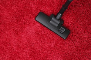 Vacuum Cleaner with Red Carpet top view
