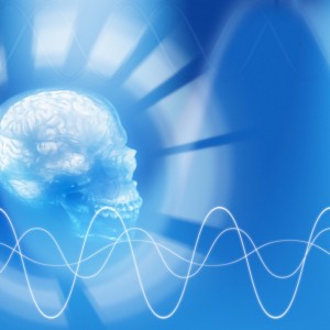 Transluscent skull and waves of brain activity