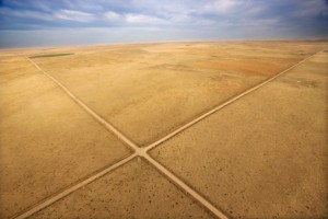 Crossroads through deserted landscape