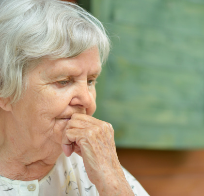 Senior thoughtful woman.