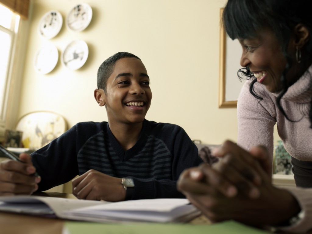 Mother and son work on homework together