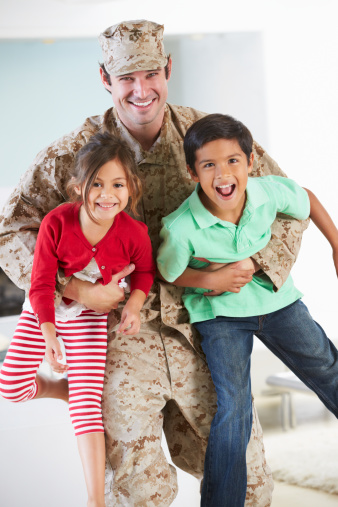 Children Greeting Military Father Home On Leave