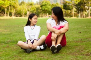 mother and daughter having a conversation