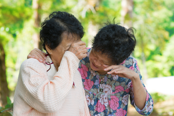 Sad senior Asian women