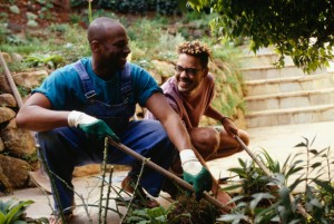 Gay couple gardening