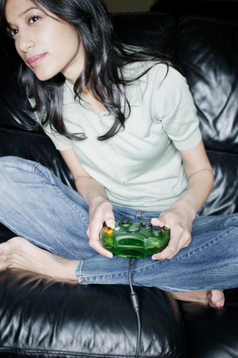 Young woman playing a video game