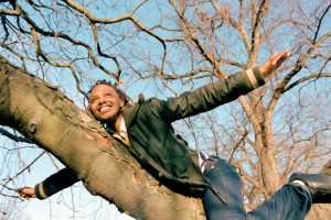 Woman balancing on branch