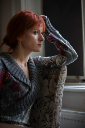 sad woman on chair