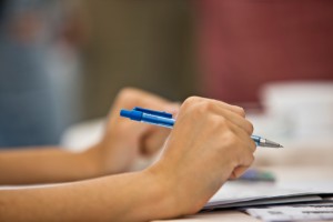 clenched hands writing